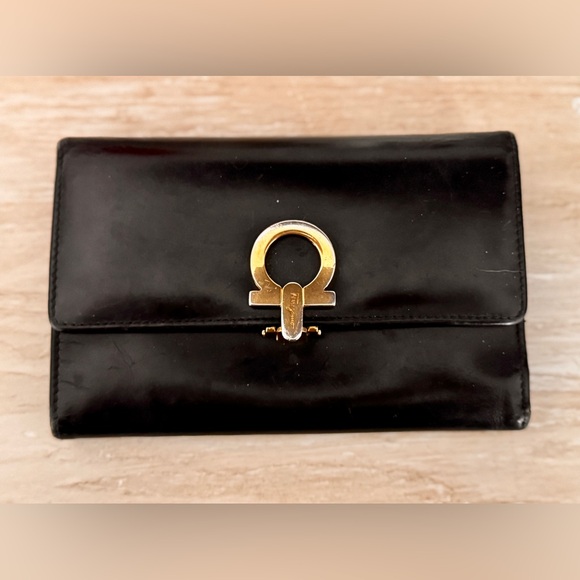 Salvatore Ferragamo Handbags - Ferragamo Black Leather Mid size Wallet with Gold Accent